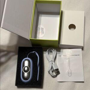 Silver and Blue Sleep Aid Device